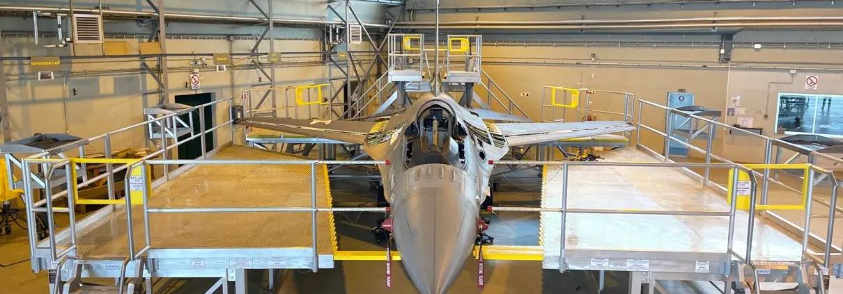 Fighter jet surrounded by scaffolding