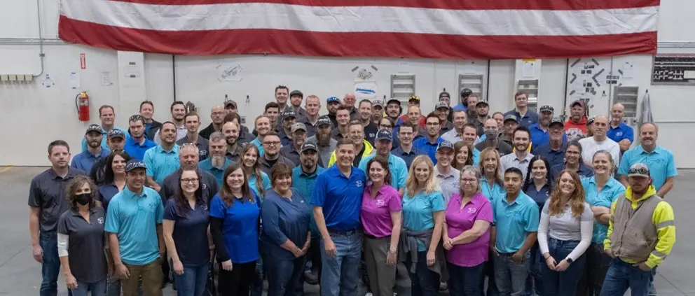 Large group wearing colorful shirts