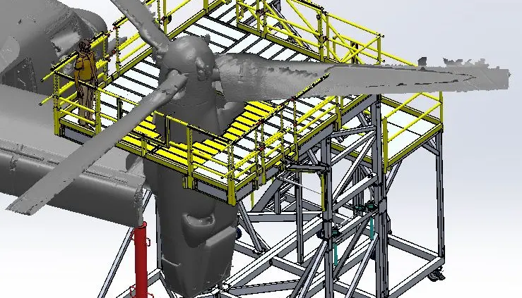 Yellow railings on aircraft maintenance structure