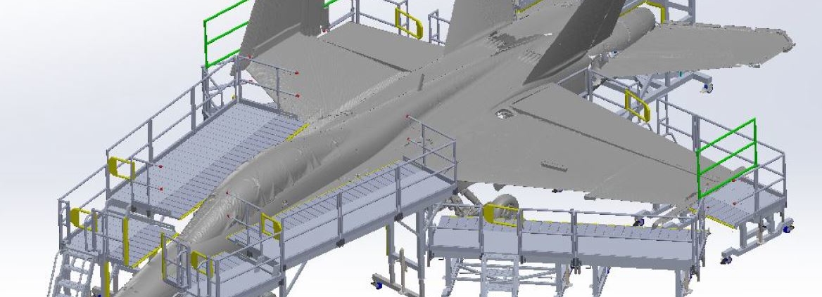 Industrial aircraft assembly line with workers and platforms.