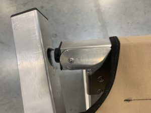 Metal hinge on a fabric frame