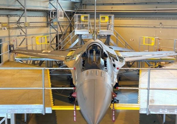 Fighter jet surrounded by scaffolding
