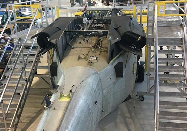 Aircraft repair area with ladders